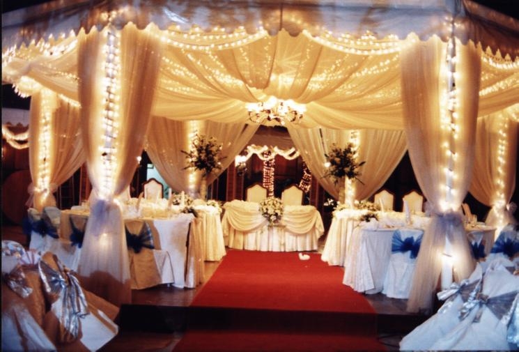 beige wedding reception decor with fuschia 
