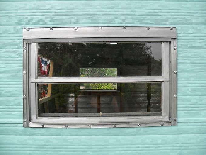 town and prairie Installing Windows in a Vintage Camper