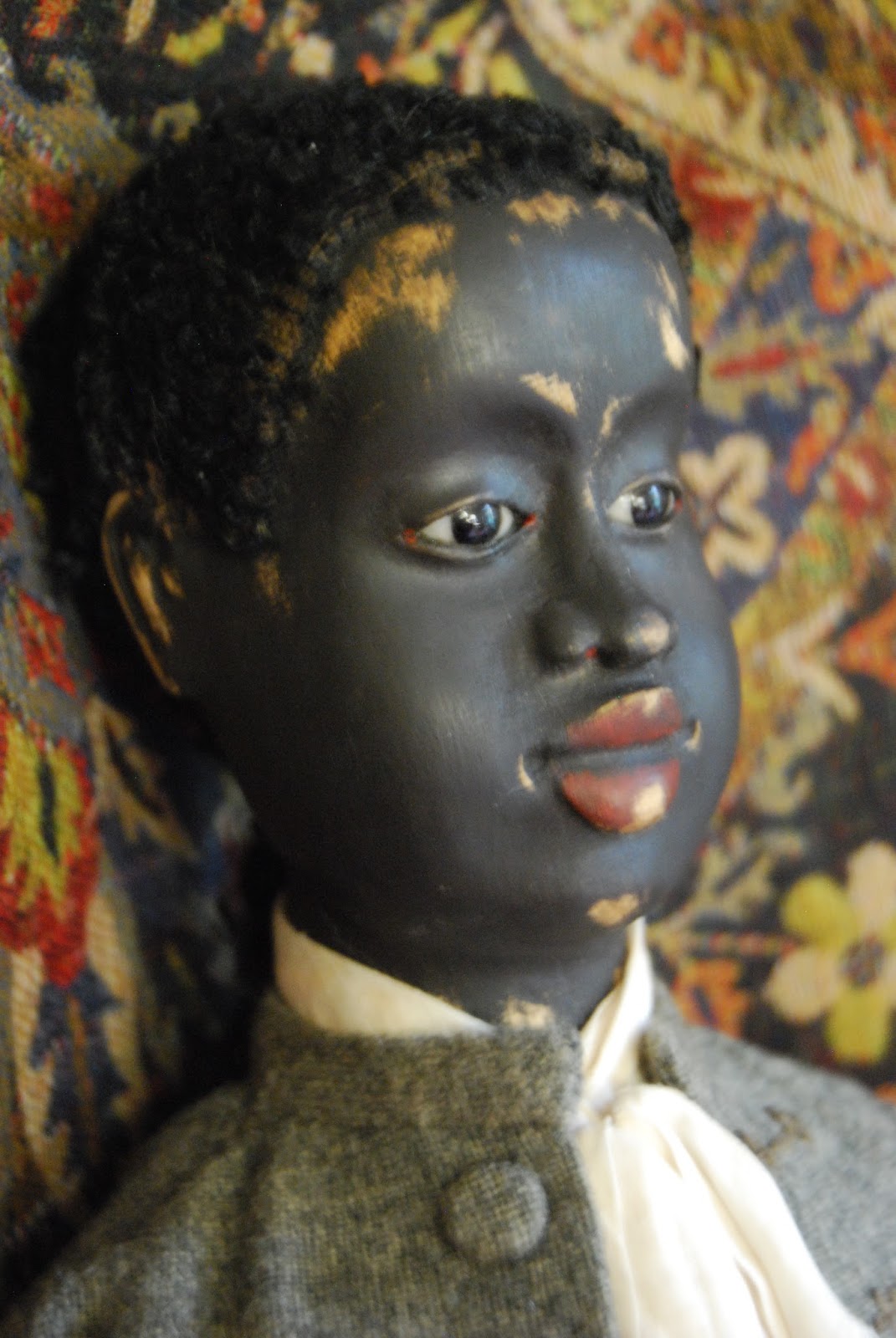 black wooden dolls