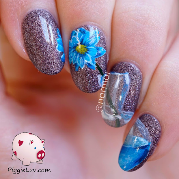 piggieluv blue flower in vase