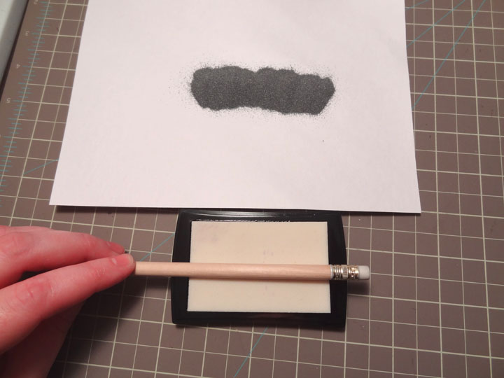 Popper and Mimi Hunger Games Pencil Toppers (and a heat embossed