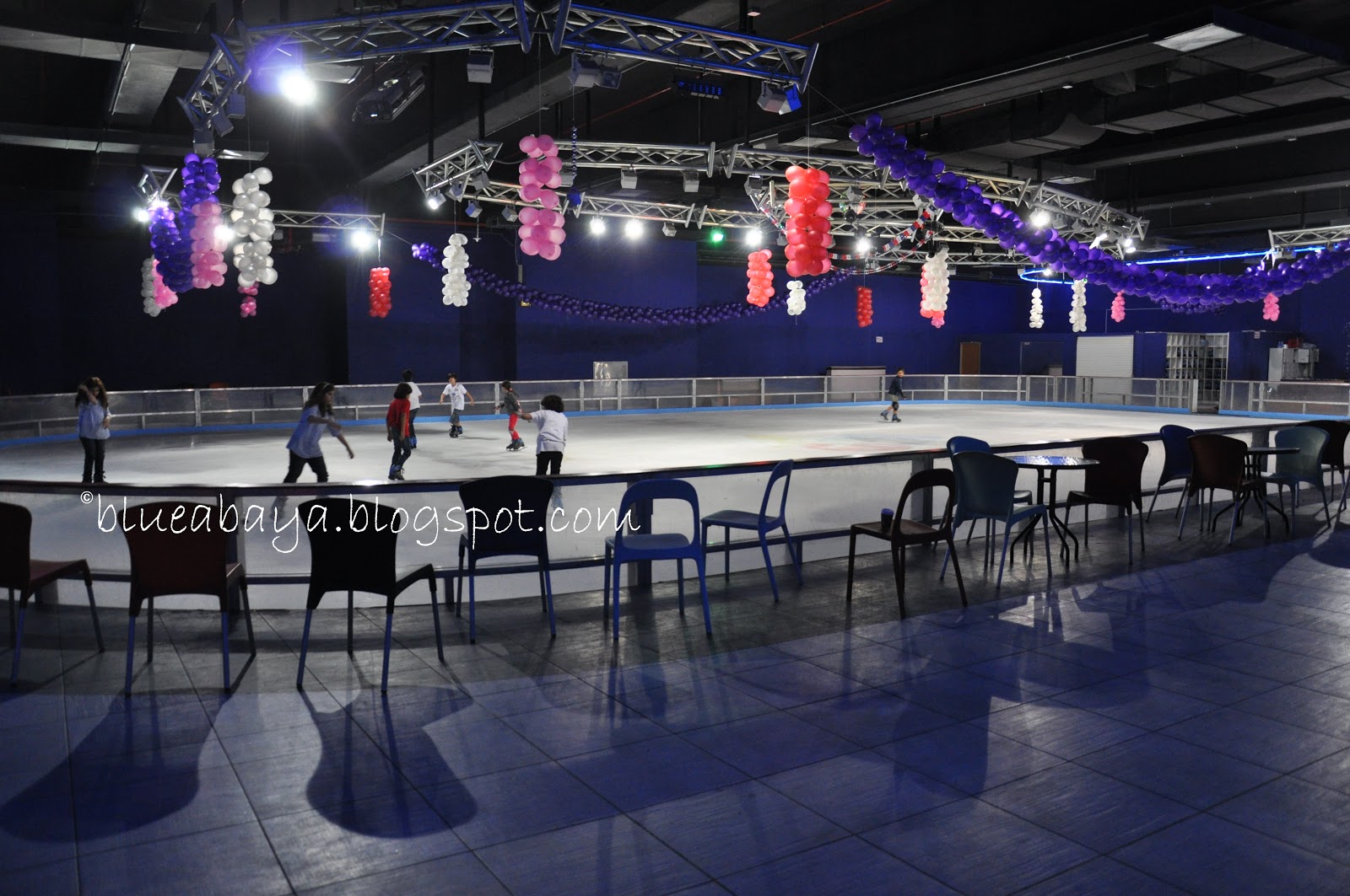 Blue Abaya Ice Skating in the Desert