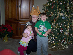 At thanksgiving dinner with papa in his turkey hat!