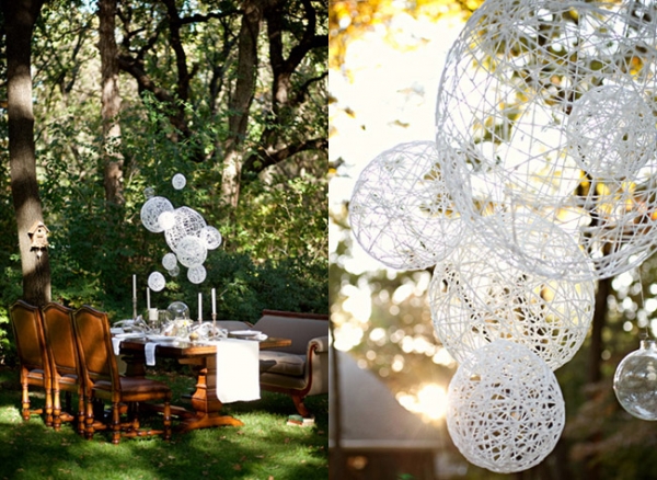 Soak the lace doilies in the wood glue and place them on the balloon with