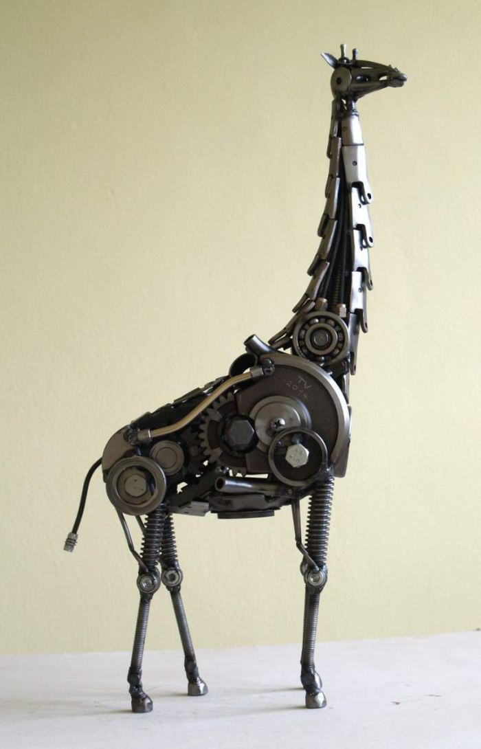 steampunk sculptures from old car and motorcycle parts art projects