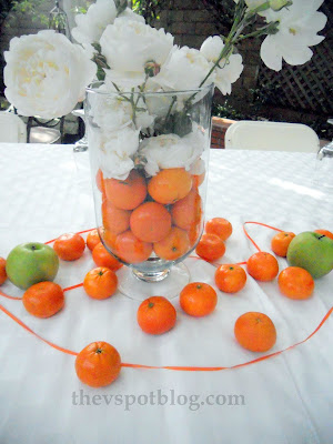 Easy floral arrangement using fruit & flowers.