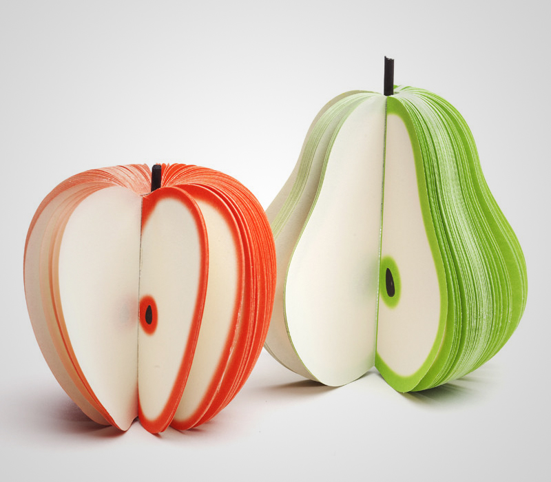 Blocos de notas em formato de maçãs e peras