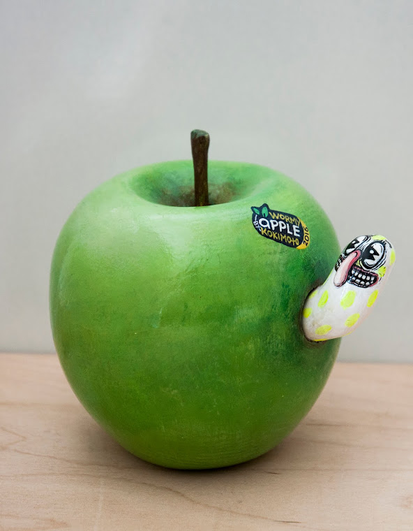 Green Wormy Apple, 2014. Acrylic, wood, sticker, 13 x 13 cm