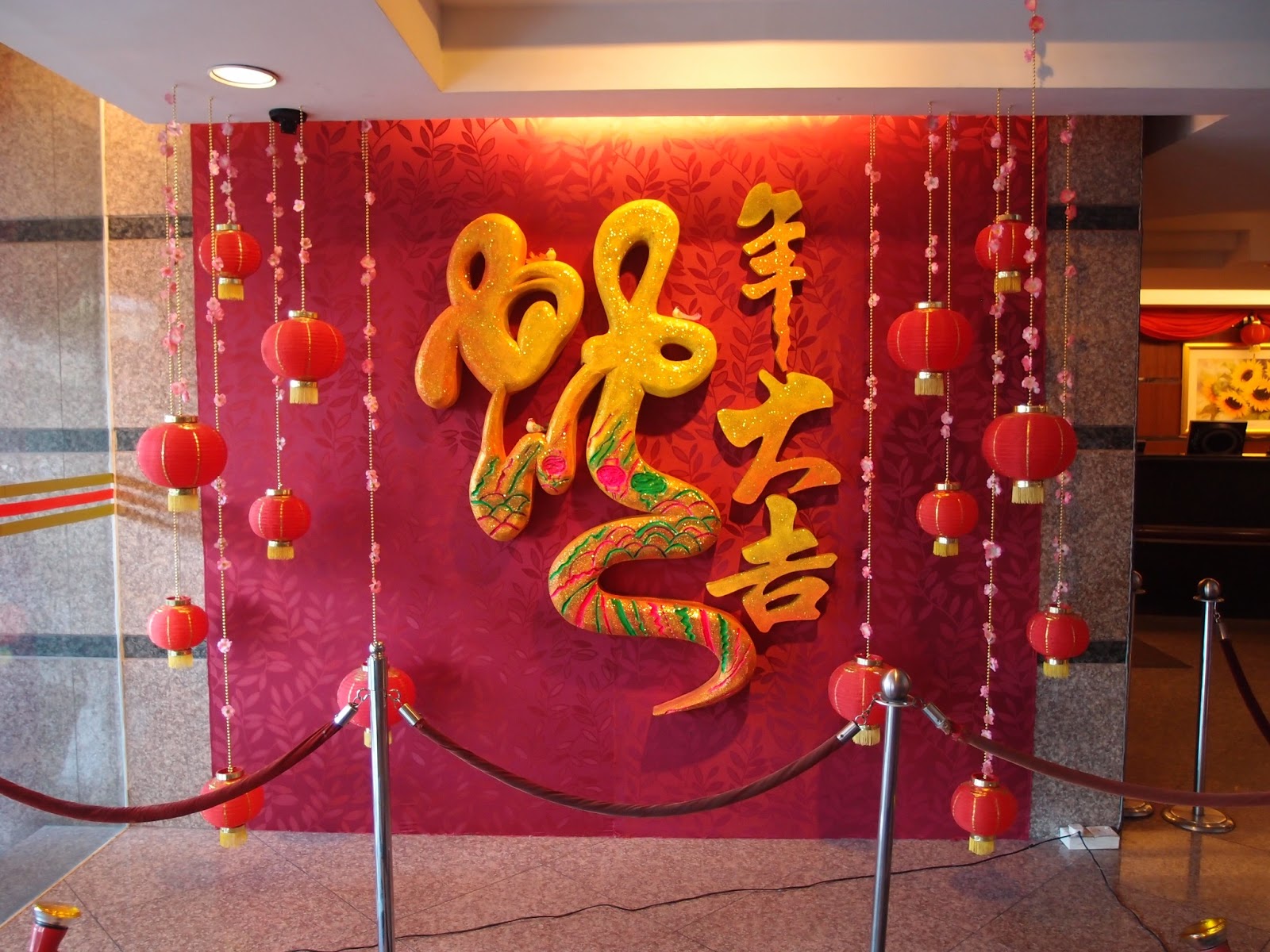 Xing Fu PLAYING ON THE IMAGE OF THE SNAKE FOR CNY DECOR