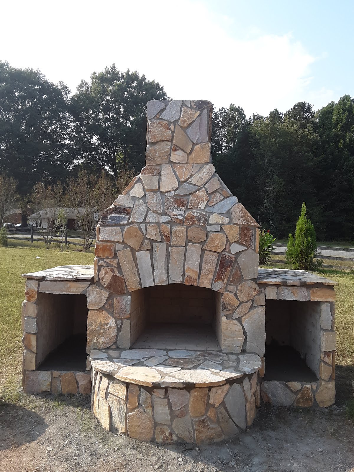 Stone outdoor fireplace