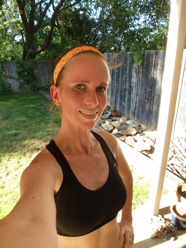 running in sports bra only