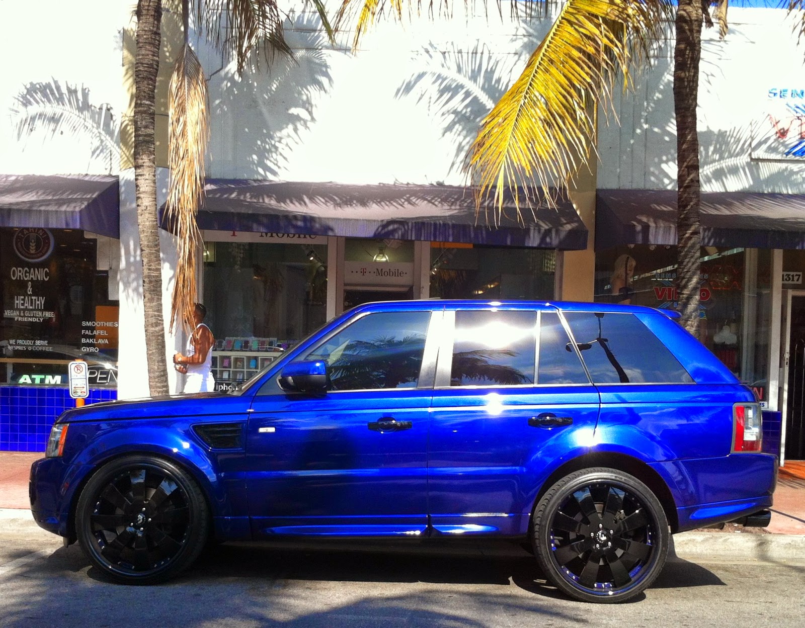 Exotic Cars on the Streets of Miami Blue Range Rover Black Rims