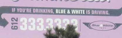 Close up of the billboard showing it's for a cab company, looking for business from people who are drunk