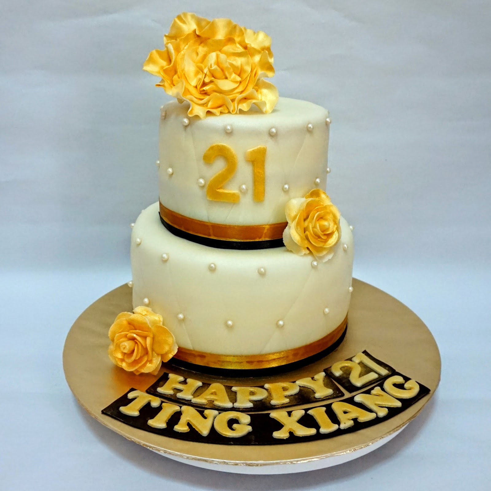 gold and black 21st birthday cake