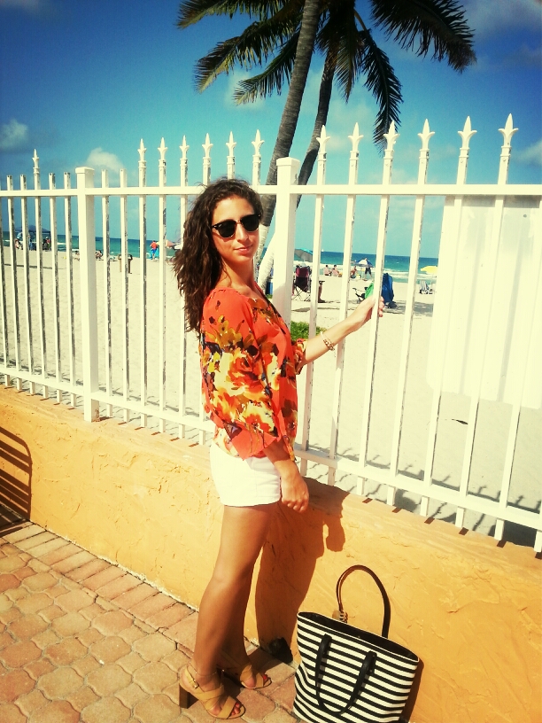 miami beach floral orange top white shorts rayban clubmasters sunglasses curly hair