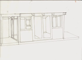 Outline of a shed split down the middle ,with two long windows and two short windows on the front and a deck on each side.