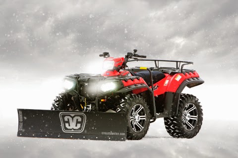 Polaris Sportsman with a Cycle Country straight steel blade accessory