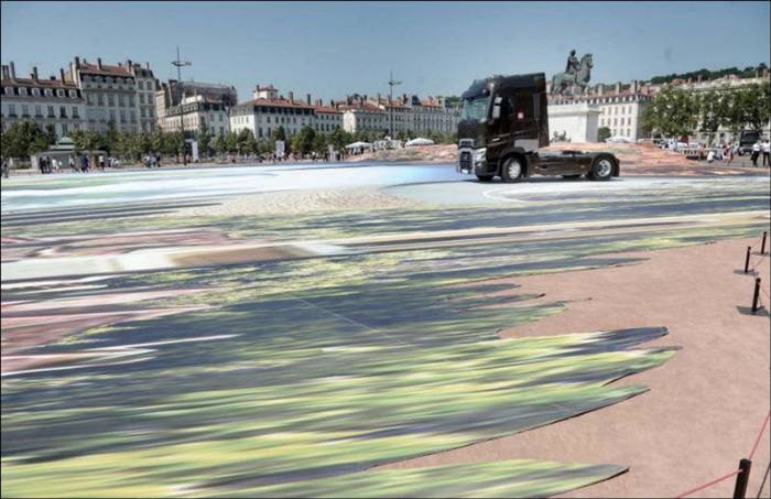 Francois Abelane is not only responsible for this incredible 4000 square meter piece of 3D street art but may also be breaking the record for the largest 3D street art in the world. Francois was commissioned to do this artwork for the launch of a new line of Renault trucks in Lyon.