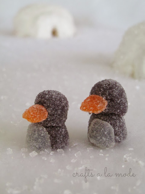 white snow and ice scene with gumdrop penguins