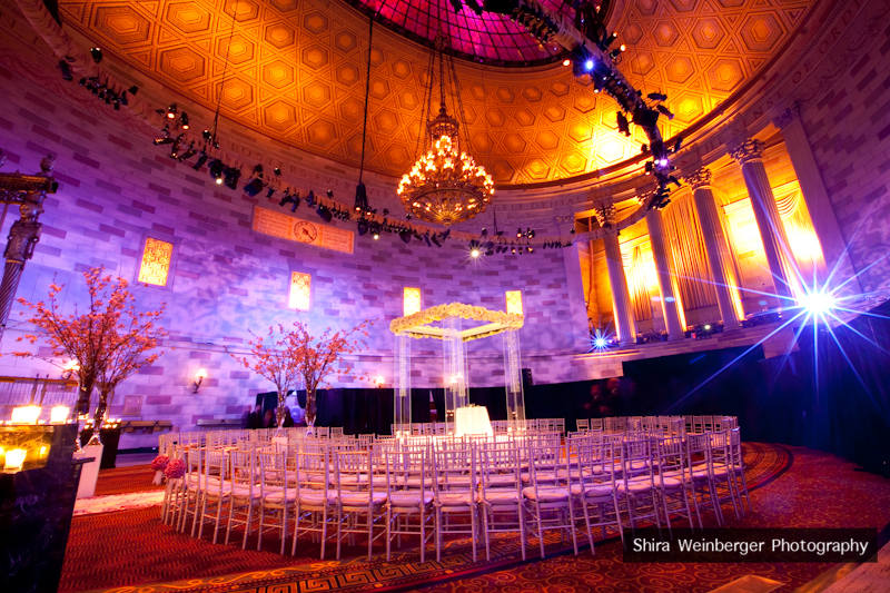 Cherry blossom trees lined the aisle and over 400 votives lined the old Cherry blossom trees lined the aisle and over 400 votives lined the old