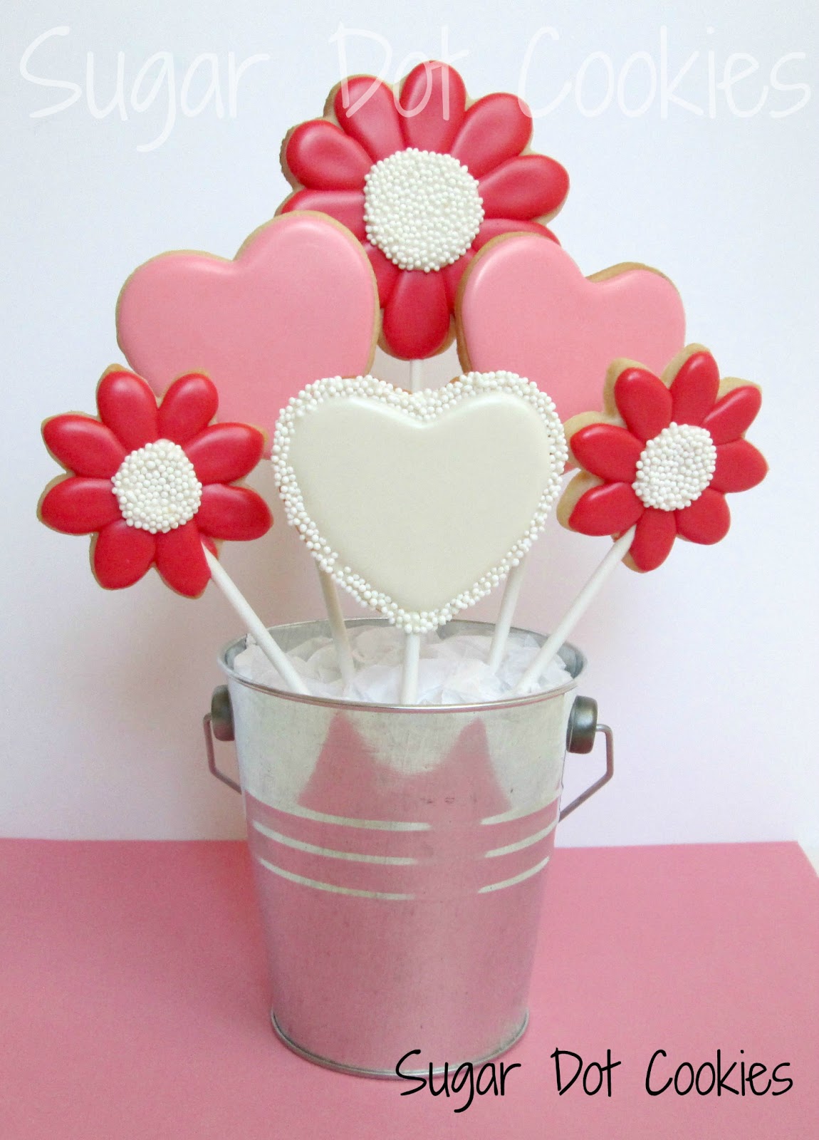 Each cookie pop is individually bagged and tied with curling ribbon.