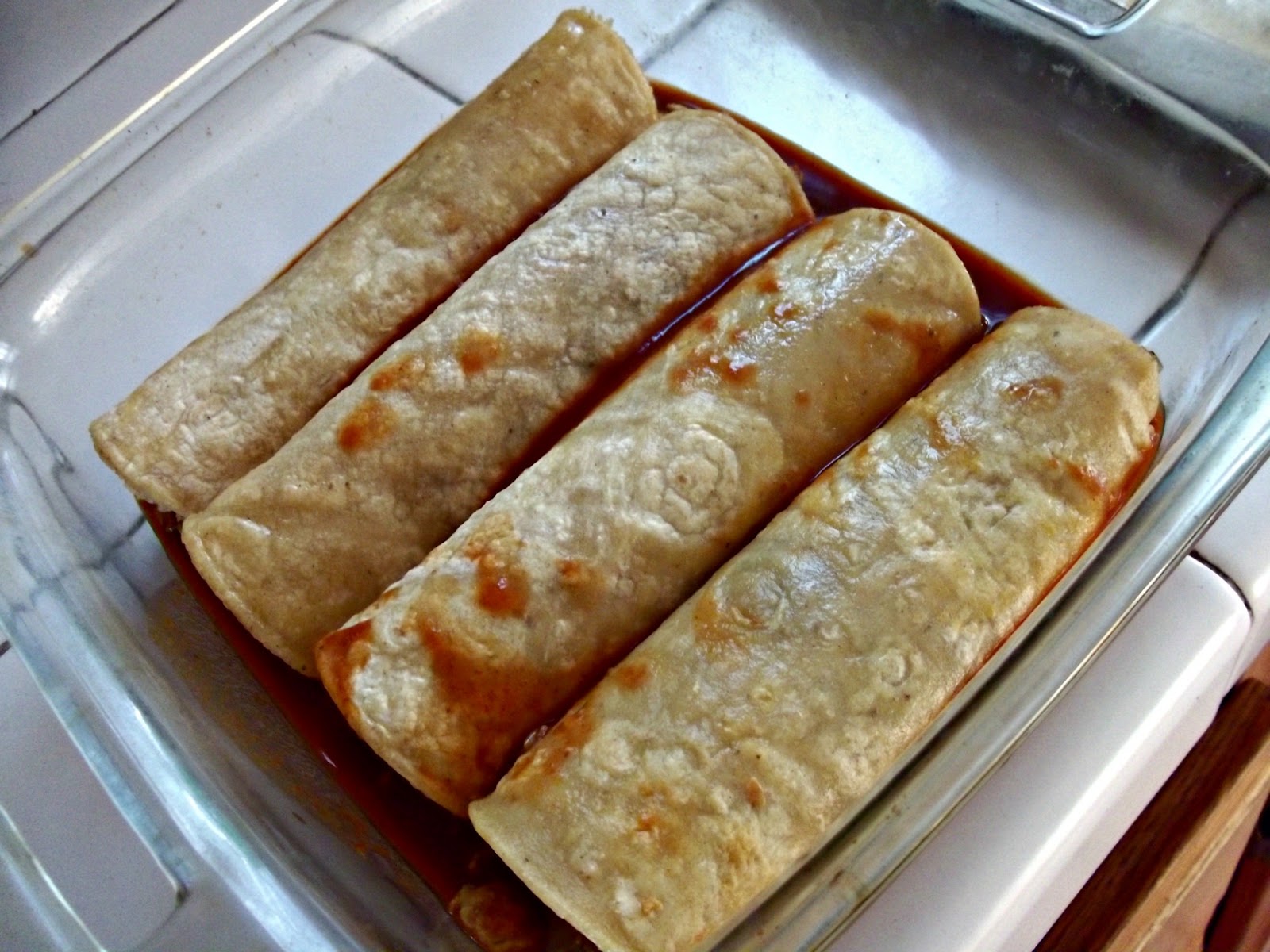 Julia's (Vegan) Kitchen Enchiladas with Tofu Sofritas and CashewLime Crema