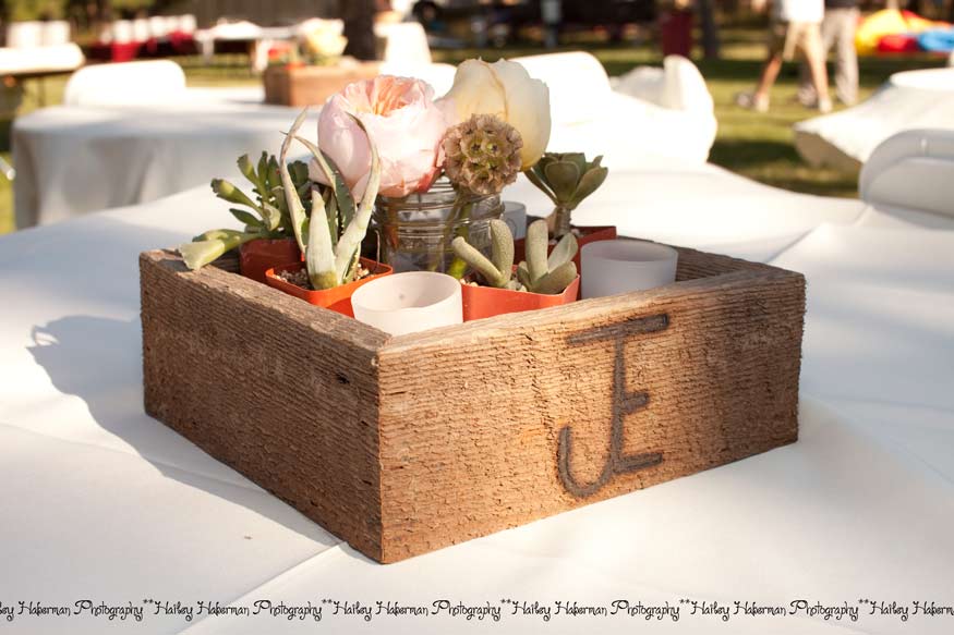 Cle Elum Backyard Wedding | Jeff and Elisia | photos of table centerpieces with barn wood and succulents