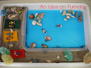 Our Summer sensory tray was extremely popular today. (summer tray)
