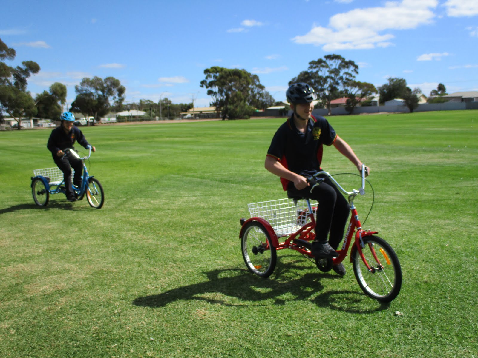 We are keeping fit cycling on the oval.