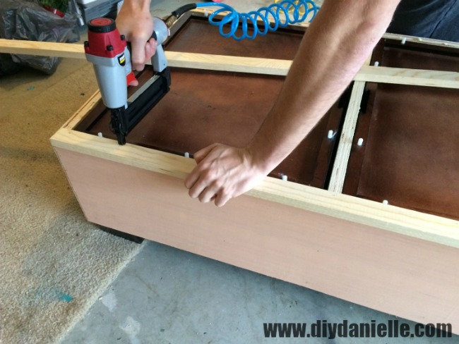 Adding a wood frame around the top of the coffee table. Adding a wood frame around the top of the coffee table.