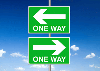 picture showing one way signs pointing both left and right