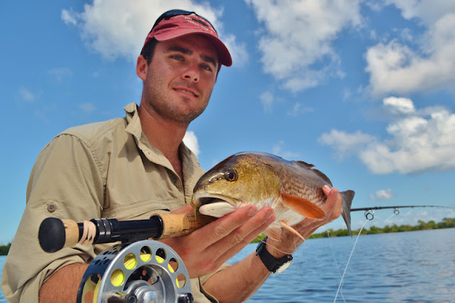 Montana angler with a healthy Redfish on Fly in the Pine Island Sound