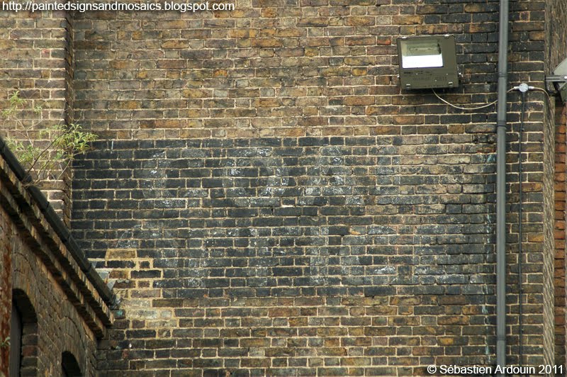 Painted signs and mosaics Coal office, King's Cross