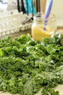 The best recipe for homemade kale chips - a mother approved and kid tested recipe.