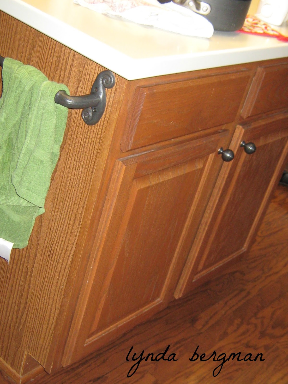 LYNDA BERGMAN DECORATIVE ARTISAN SHANNA'S NEWLY PAINTED, BLACK DISTRESSED KITCHEN