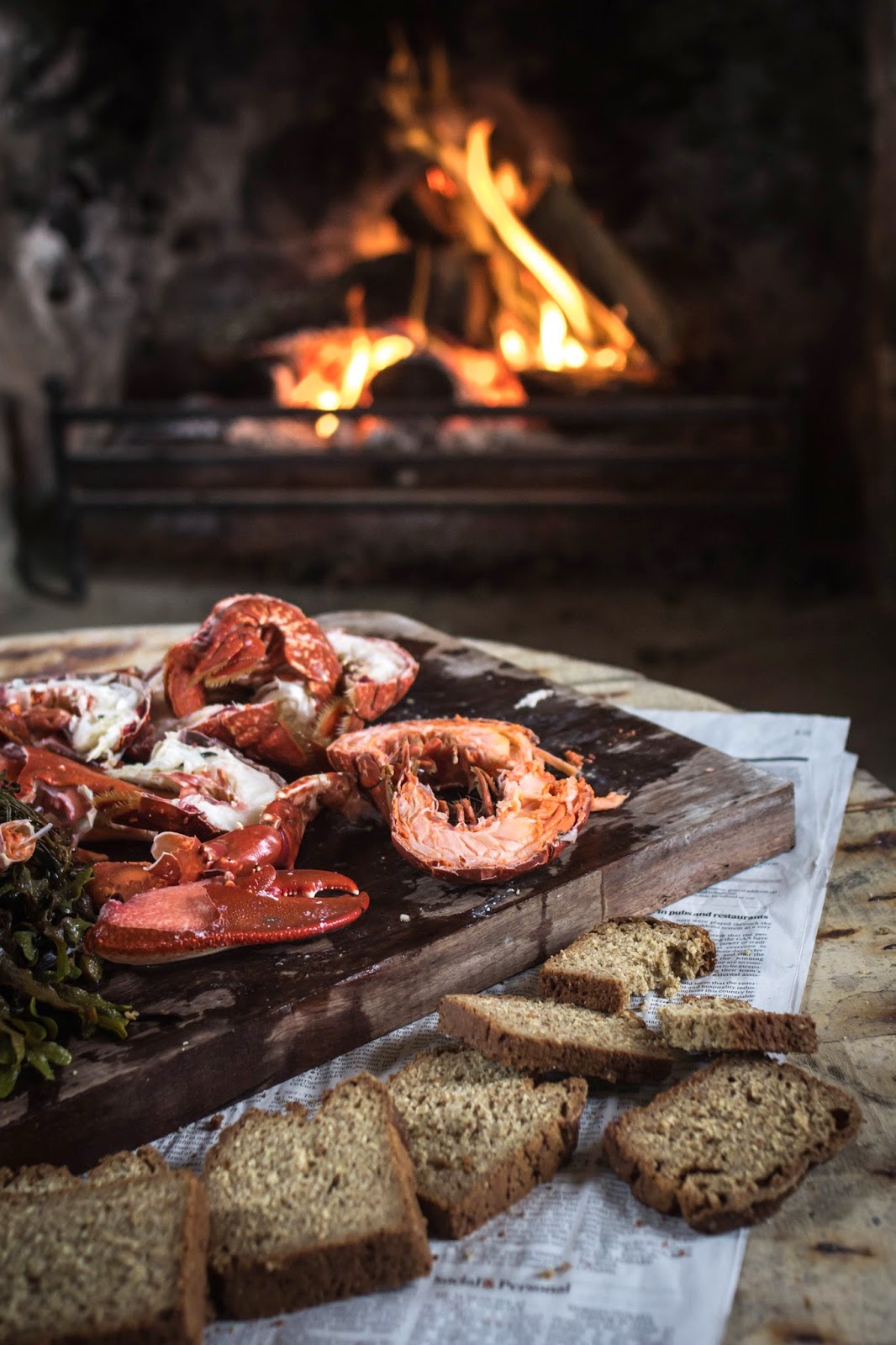 Eating lobster and soda bread by the fire place Lens and Larder Food Styling Photography Retreat