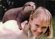 Sophie Neville, the girl with a tame otter. 'Otter with girl'