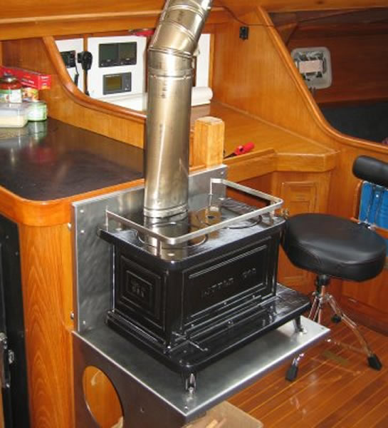 tiny, tiny, tiny cast iron wood stoves from