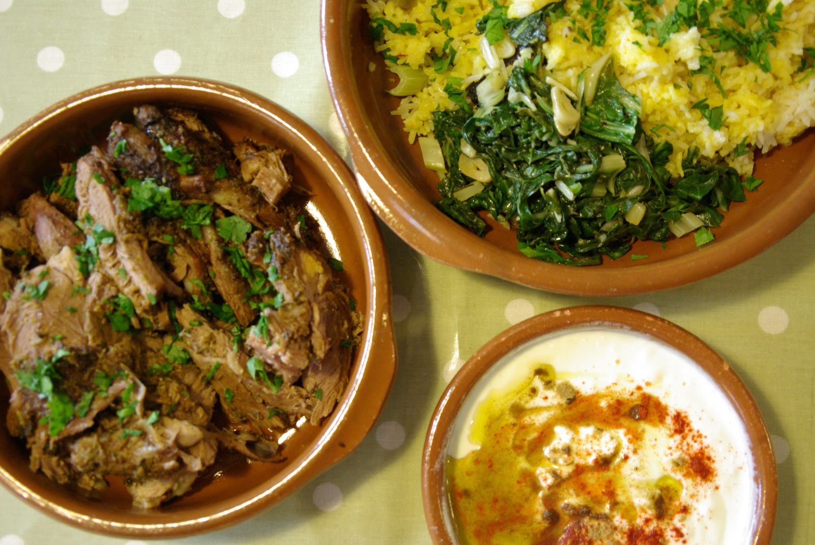 Moorish shoulder of lamb, saffron rice, swiss chard with garlic, and