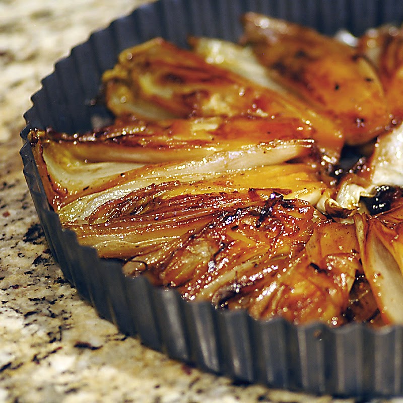 Savoring Time in the Kitchen Duck Confit and Caramelized Endive Tarte