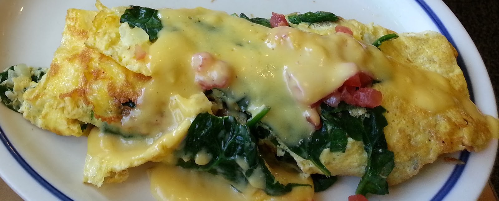 D33RFLIES Spinach, Mushroom & Cheese Omelette with Hollandaise Sauce