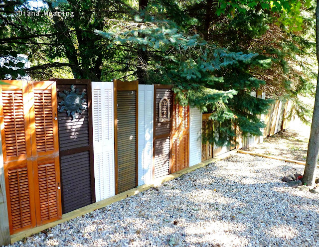 One cool repurposed shutter and old door fence - Diana Wearing