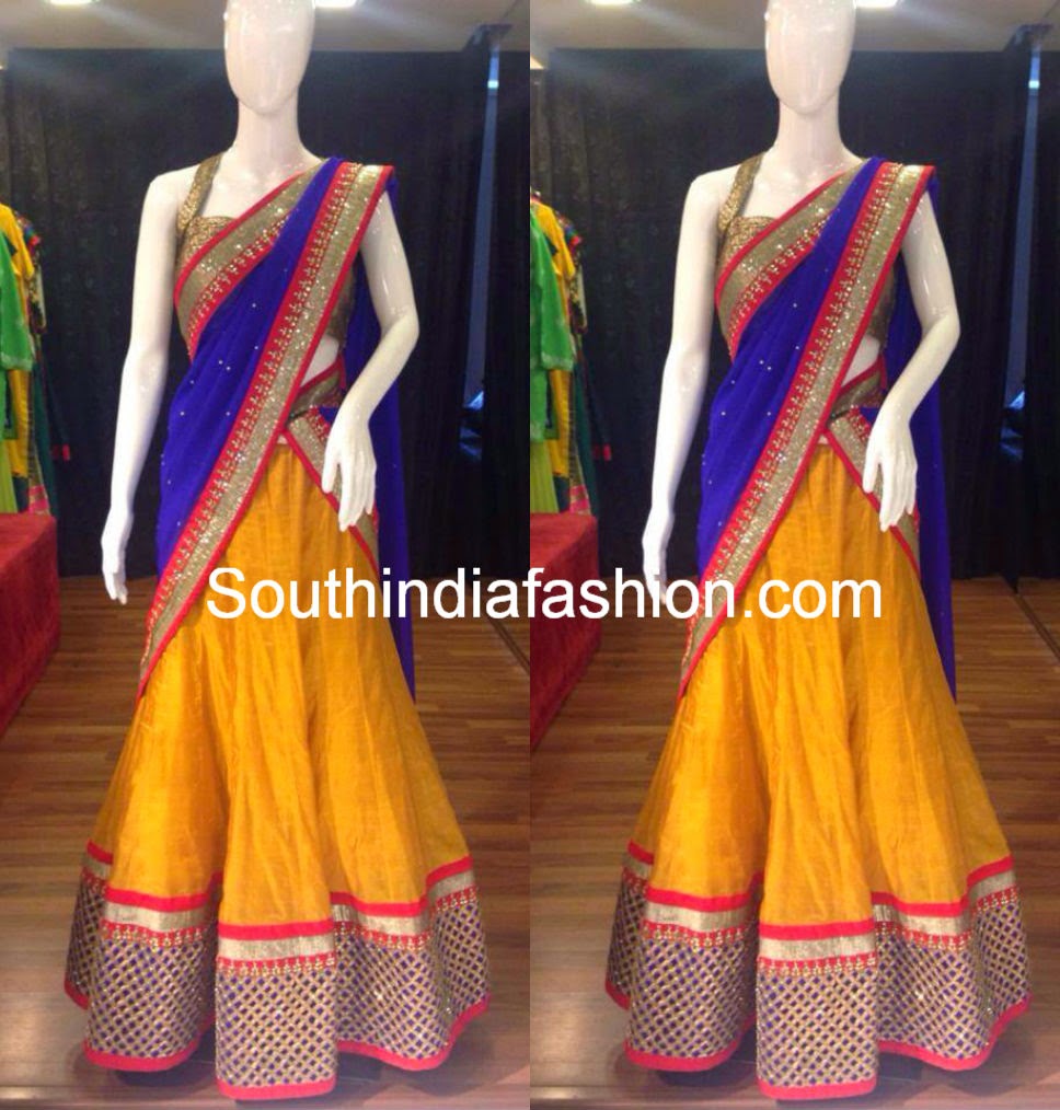 Half+Saree+Designers+in+Hyderabad Beautiful yellow lehenga with cut work border and blue duppatta with ...