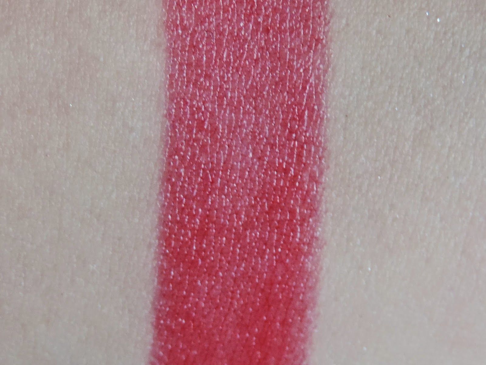 Swatch of Urban Decay Sheer Revolution Lipstick in F-Bomb