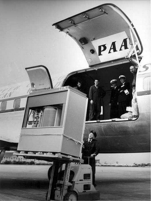 Uploading the first 5 MByte hard disk to a PanAm plane, 1956 vintage