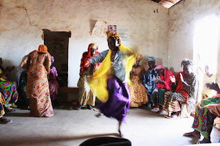 Tostan CEP Participants in Tambasansang, The Gambia put class topics to lyrics and dance
