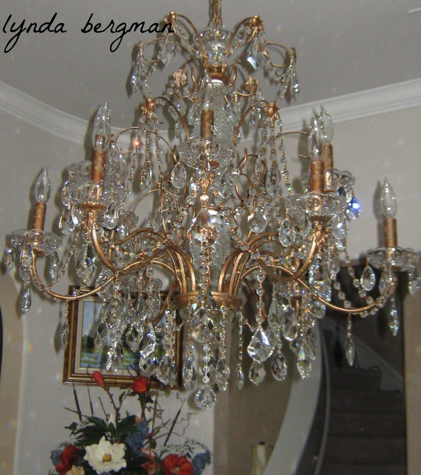 LYNDA BERGMAN DECORATIVE ARTISAN PAINTING A BEAUTIFUL CHANDELIER FROM SHINY BRASS TO A DARKER