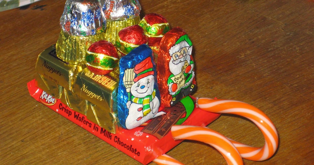 Pondering Cat Candy Santa Sleighs