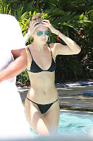 Candice Swanepoel at Miami pool