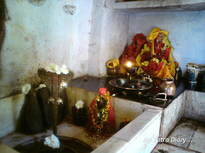 The Shivling inside the cave at Jyoteshwar Mahadeo Temple at Joshimath near Badrinath in the Himalayas
